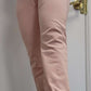 Woman modeling active-wear brand Sweat or Sparkle Athletics Millennial Pink Sweatpants.