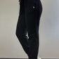 Woman modeling active-wear brand Sweat or Sparkle Athletics Black Sweatpants.