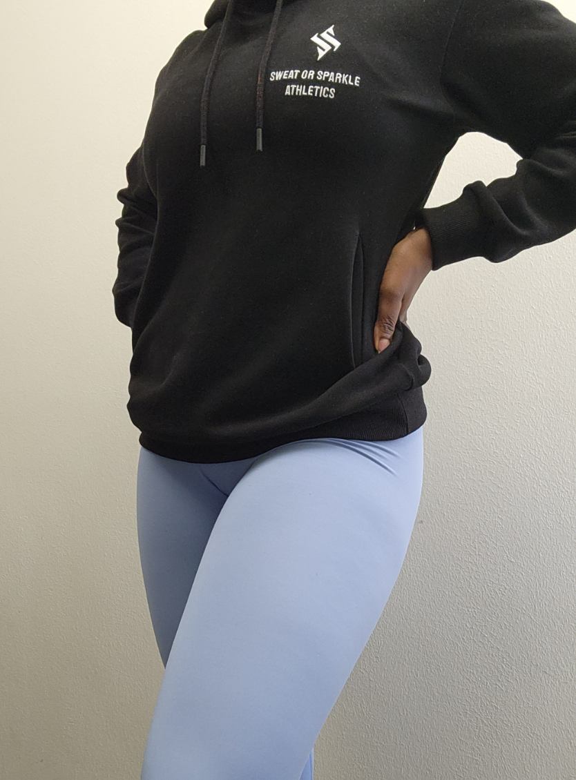 Woman modeling active-wear brand Sweat or Sparkle Athletics Black Hoodie.