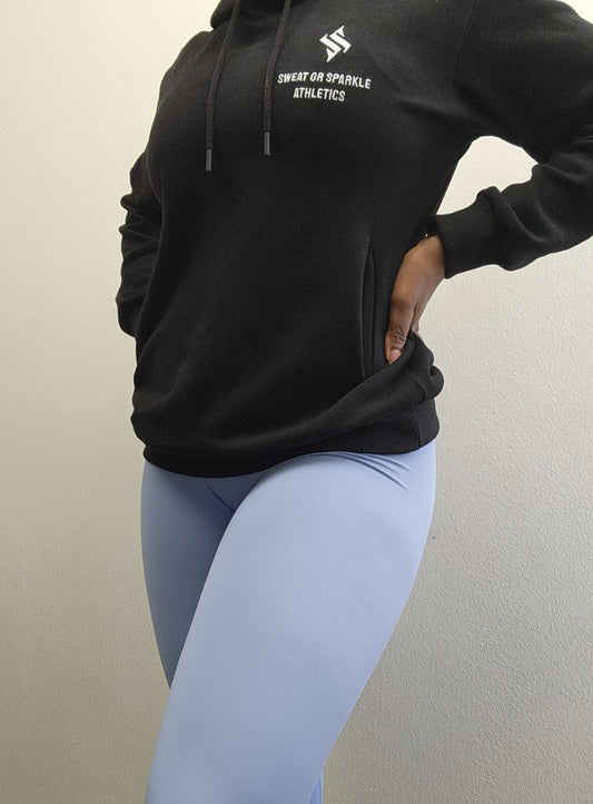 Woman modeling active-wear brand Sweat or Sparkle Athletics Black Hoodie.