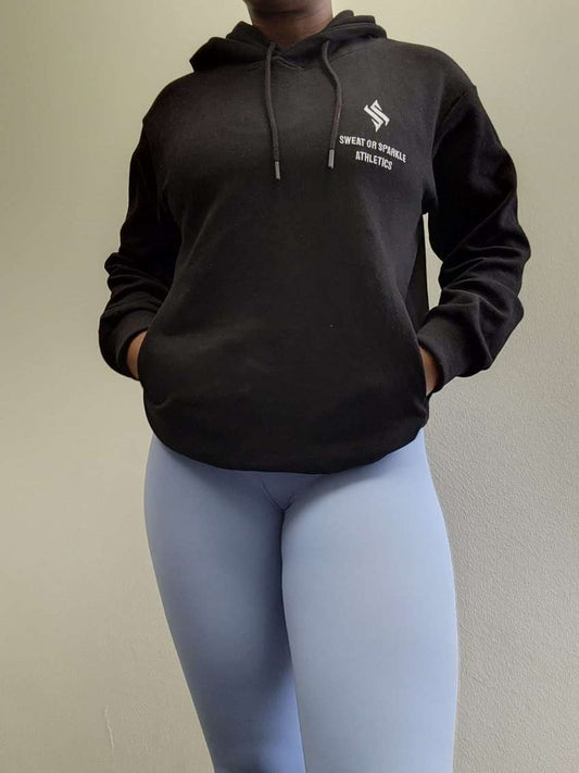 Woman modeling active-wear brand Sweat or Sparkle Athletics Black Hooded Sweatshirt.